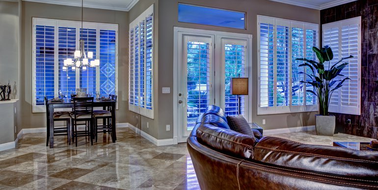 Denver great room with white shutters and modern lighting.
